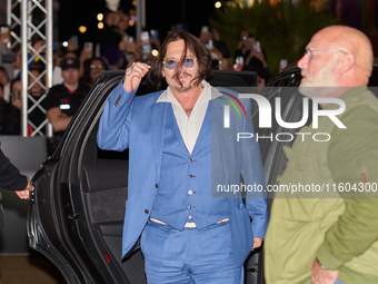 Johnny Depp arrives at the Maria Cristina hotel during the 72nd San Sebastian International Film Festival in San Sebastian, Spain, on Septem...