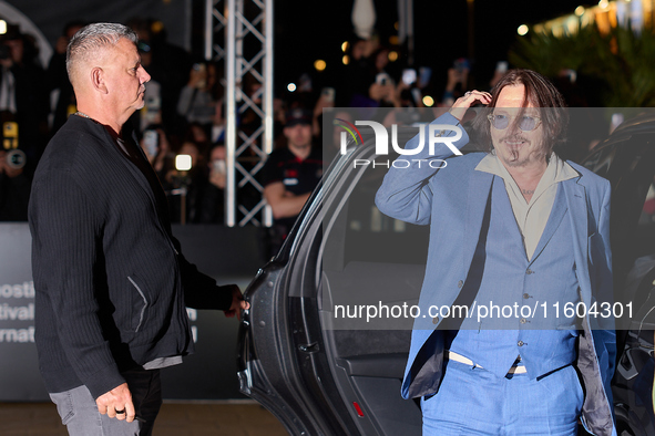 Johnny Depp arrives at the Maria Cristina hotel during the 72nd San Sebastian International Film Festival in San Sebastian, Spain, on Septem...