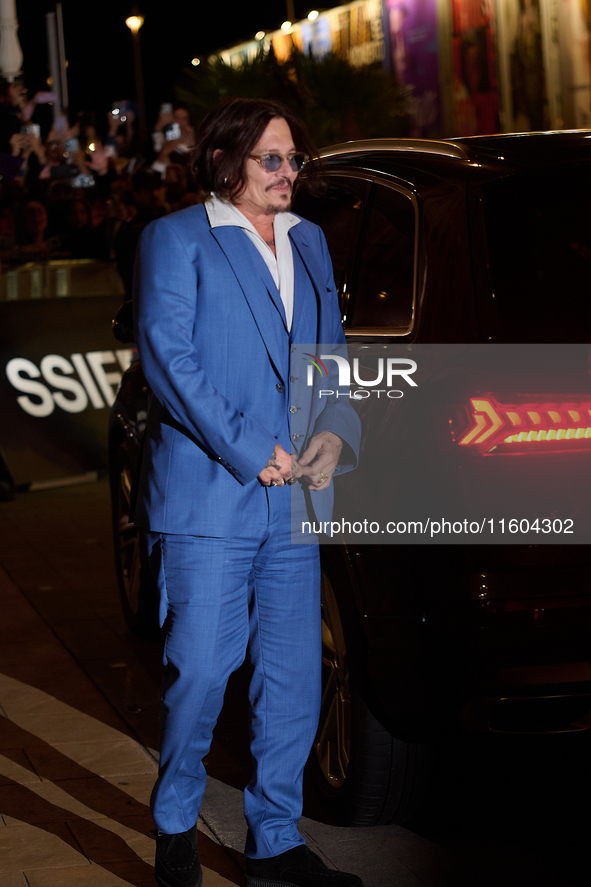 Johnny Depp arrives at the Maria Cristina hotel during the 72nd San Sebastian International Film Festival in San Sebastian, Spain, on Septem...