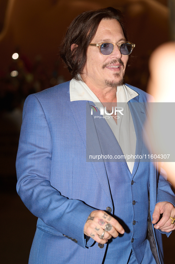 Johnny Depp arrives at the Maria Cristina hotel during the 72nd San Sebastian International Film Festival in San Sebastian, Spain, on Septem...