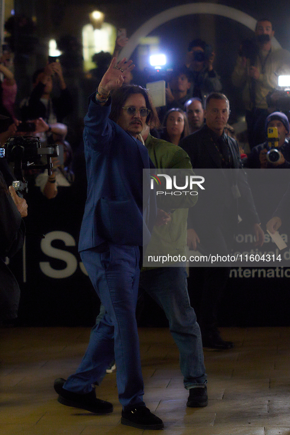 Johnny Depp arrives at the Maria Cristina hotel during the 72nd San Sebastian International Film Festival in San Sebastian, Spain, on Septem...