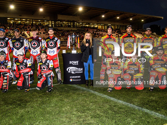 The teams line up for the TV cameras during the Rowe Motor Oil Premiership Grand Final 1st Leg between Belle Vue Aces and Leicester Lions at...