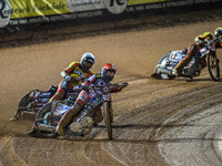 Belle Vue Aces' Jaimon Lidsey in red leads Leicester Lions' Sam Masters in white and Leicester Lions' Luke Becker in yellow during the Rowe...