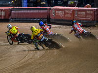 Leicester Lions' guest rider Lewis Kerr chases Leicester Lions' Ryan Douglas, Belle Vue Aces' Jake Mulford in blue, and Belle Vue Aces' Dan...