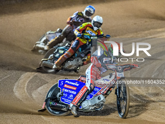 Dan Bewley of Belle Vue Aces in red leads Ryan Douglas of Leicester Lions in white and Jake Mulford of Belle Vue Aces in blue during the Row...