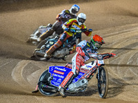 Dan Bewley of Belle Vue Aces in red leads Ryan Douglas of Leicester Lions in white and Jake Mulford of Belle Vue Aces in blue during the Row...