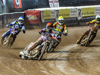 Belle Vue Aces' Jaimon Lidsey in red leads Belle Vue Aces' guest rider Niels K. Iversen in blue, Leicester Lions' Max Fricke in white, and L...