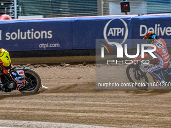 Belle Vue Aces' Dan Bewley in red chases Leicester Lions' Sam Masters in white during the Rowe Motor Oil Premiership Grand Final 1st Leg bet...