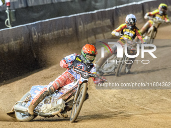 Belle Vue Aces' Dan Bewley in red leads Leicester Lions' Sam Masters in white and Leicester Lions' Luke Becker in yellow during the Rowe Mot...