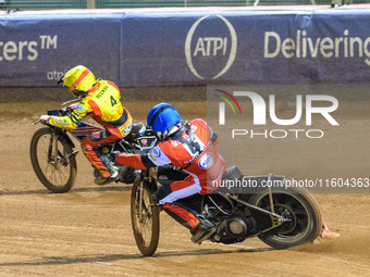 Belle Vue Aces' Antti Vuolas in blue chases Leicester Lions' Luke Becker during the Rowe Motor Oil Premiership Grand Final 1st Leg between B...