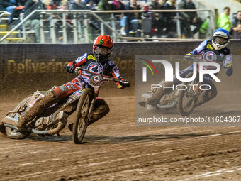 Belle Vue Aces' Jaimon Lidsey in red leads Belle Vue Aces' guest rider Niels K. Iversen in blue during the Rowe Motor Oil Premiership Grand...