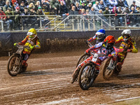 Dan Bewley of Belle Vue Aces in red leads Max Fricke of Leicester Lions in white, Antti Vuolas of Belle Vue Aces in blue, and Richard Lawson...