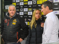 Eurosport presenter Abi Stephens (center) interviews Belle Vue Aces' Team Manager Mark Lemon (right) with Leicester Lions' Team Manager Stua...