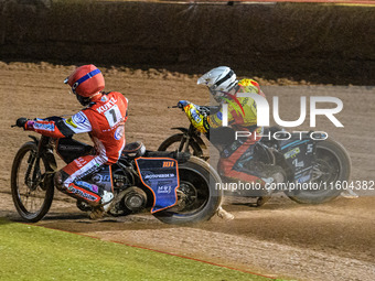 Belle Vue Aces' Brady Kurtz in red rides inside Leicester Lions' Ryan Douglas in white during the Rowe Motor Oil Premiership Grand Final 1st...