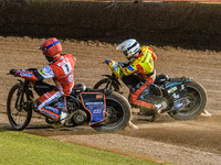 Belle Vue Aces' Brady Kurtz in red rides inside Leicester Lions' Ryan Douglas in white during the Rowe Motor Oil Premiership Grand Final 1st...