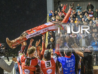 Belle Vue Aces' Dan Bewley receives bumps from his teammates after his full maximum score during the Rowe Motor Oil Premiership Grand Final...