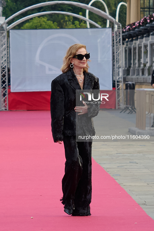 Isabelle Huppert attends the red carpet of the film Yeohaengjaui Pilyo during the 72nd San Sebastian International Film Festival in San Seba...