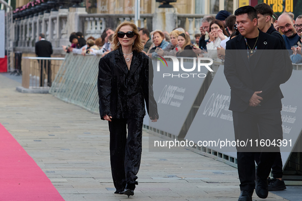 Isabelle Huppert attends the red carpet of the film Yeohaengjaui Pilyo during the 72nd San Sebastian International Film Festival in San Seba...