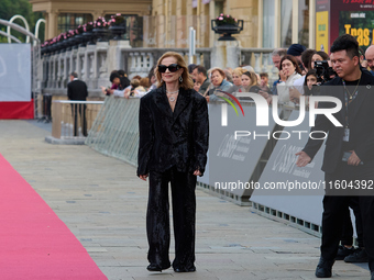 Isabelle Huppert attends the red carpet of the film Yeohaengjaui Pilyo during the 72nd San Sebastian International Film Festival in San Seba...