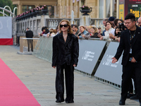 Isabelle Huppert attends the red carpet of the film Yeohaengjaui Pilyo during the 72nd San Sebastian International Film Festival in San Seba...