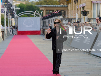 Isabelle Huppert attends the red carpet of the film Yeohaengjaui Pilyo during the 72nd San Sebastian International Film Festival in San Seba...