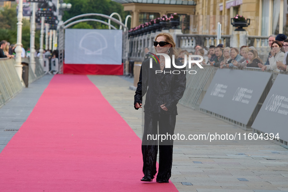 Isabelle Huppert attends the red carpet of the film Yeohaengjaui Pilyo during the 72nd San Sebastian International Film Festival in San Seba...