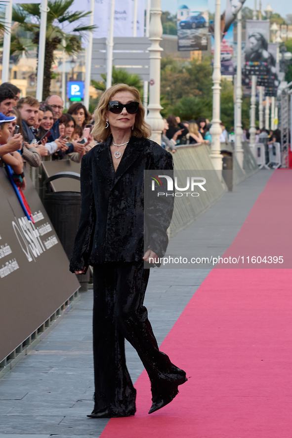 Isabelle Huppert attends the red carpet of the film Yeohaengjaui Pilyo during the 72nd San Sebastian International Film Festival in San Seba...