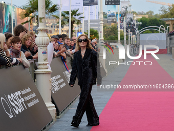 Isabelle Huppert attends the red carpet of the film Yeohaengjaui Pilyo during the 72nd San Sebastian International Film Festival in San Seba...