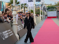 Isabelle Huppert attends the red carpet of the film Yeohaengjaui Pilyo during the 72nd San Sebastian International Film Festival in San Seba...