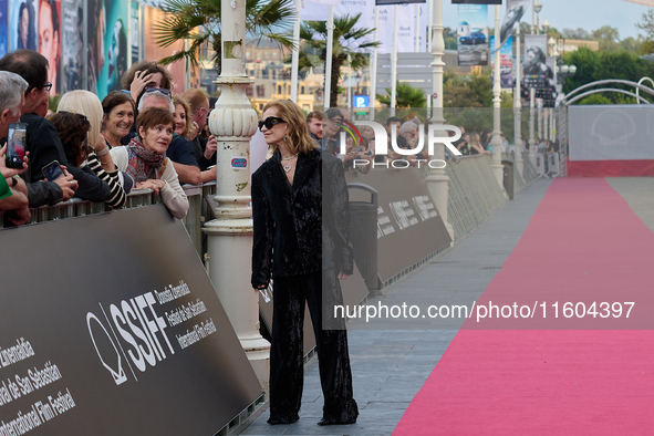 Isabelle Huppert attends the red carpet of the film Yeohaengjaui Pilyo during the 72nd San Sebastian International Film Festival in San Seba...