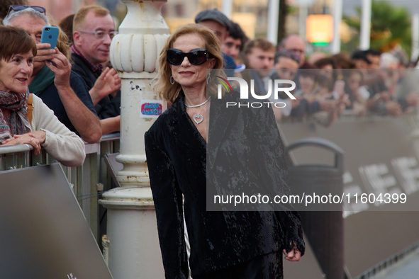 Isabelle Huppert attends the red carpet of the film Yeohaengjaui Pilyo during the 72nd San Sebastian International Film Festival in San Seba...