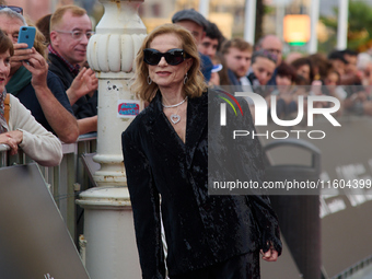 Isabelle Huppert attends the red carpet of the film Yeohaengjaui Pilyo during the 72nd San Sebastian International Film Festival in San Seba...