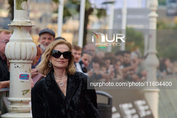 Isabelle Huppert attends the red carpet of the film Yeohaengjaui Pilyo during the 72nd San Sebastian International Film Festival in San Seba...