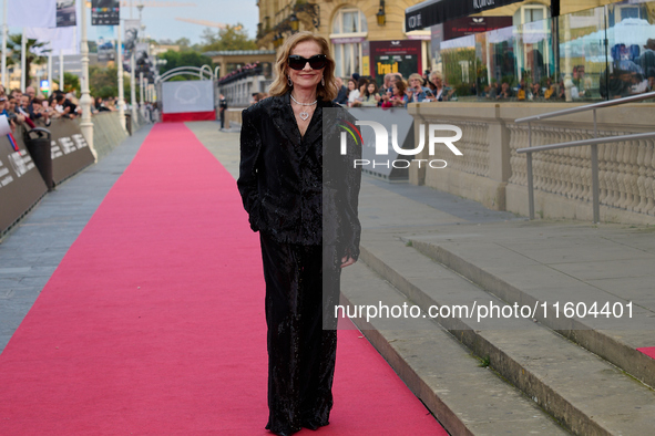 Isabelle Huppert attends the red carpet of the film Yeohaengjaui Pilyo during the 72nd San Sebastian International Film Festival in San Seba...