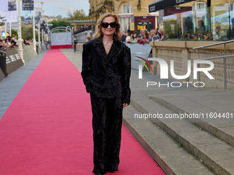 Isabelle Huppert attends the red carpet of the film Yeohaengjaui Pilyo during the 72nd San Sebastian International Film Festival in San Seba...