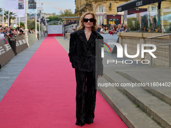 Isabelle Huppert attends the red carpet of the film Yeohaengjaui Pilyo during the 72nd San Sebastian International Film Festival in San Seba...