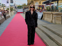 Isabelle Huppert attends the red carpet of the film Yeohaengjaui Pilyo during the 72nd San Sebastian International Film Festival in San Seba...