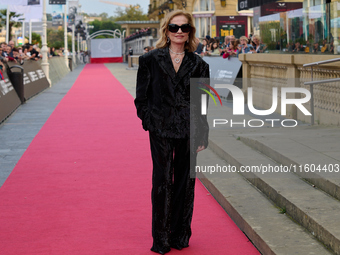 Isabelle Huppert attends the red carpet of the film Yeohaengjaui Pilyo during the 72nd San Sebastian International Film Festival in San Seba...