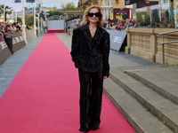 Isabelle Huppert attends the red carpet of the film Yeohaengjaui Pilyo during the 72nd San Sebastian International Film Festival in San Seba...