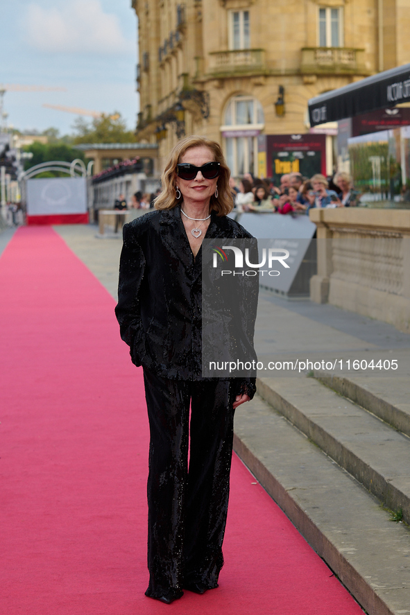 Isabelle Huppert attends the red carpet of the film Yeohaengjaui Pilyo during the 72nd San Sebastian International Film Festival in San Seba...