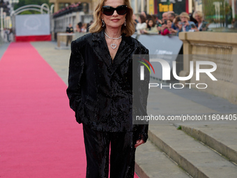 Isabelle Huppert attends the red carpet of the film Yeohaengjaui Pilyo during the 72nd San Sebastian International Film Festival in San Seba...