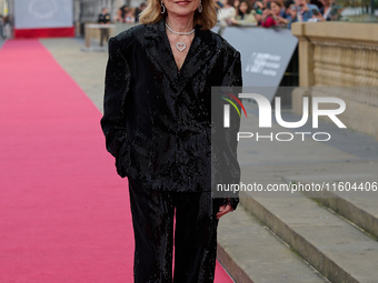 Isabelle Huppert attends the red carpet of the film Yeohaengjaui Pilyo during the 72nd San Sebastian International Film Festival in San Seba...