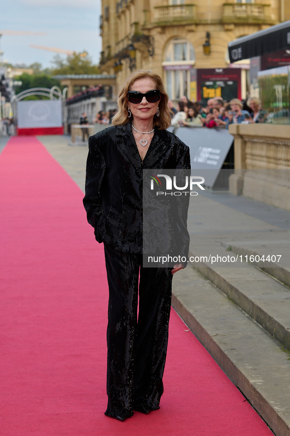 Isabelle Huppert attends the red carpet of the film Yeohaengjaui Pilyo during the 72nd San Sebastian International Film Festival in San Seba...