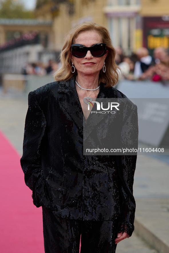 Isabelle Huppert attends the red carpet of the film Yeohaengjaui Pilyo during the 72nd San Sebastian International Film Festival in San Seba...