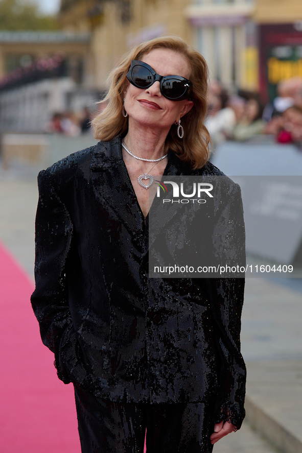 Isabelle Huppert attends the red carpet of the film Yeohaengjaui Pilyo during the 72nd San Sebastian International Film Festival in San Seba...