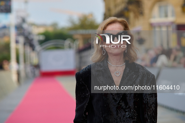 Isabelle Huppert attends the red carpet of the film Yeohaengjaui Pilyo during the 72nd San Sebastian International Film Festival in San Seba...