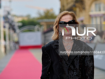 Isabelle Huppert attends the red carpet of the film Yeohaengjaui Pilyo during the 72nd San Sebastian International Film Festival in San Seba...