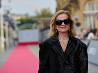 Isabelle Huppert attends the red carpet of the film Yeohaengjaui Pilyo during the 72nd San Sebastian International Film Festival in San Seba...