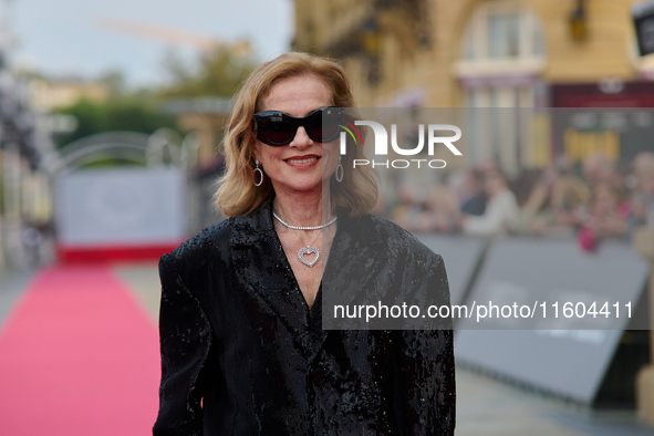 Isabelle Huppert attends the red carpet of the film Yeohaengjaui Pilyo during the 72nd San Sebastian International Film Festival in San Seba...