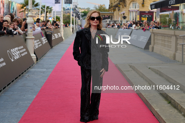 Isabelle Huppert attends the red carpet of the film Yeohaengjaui Pilyo during the 72nd San Sebastian International Film Festival in San Seba...